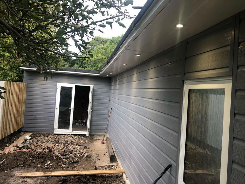 Exterior soffit downlights